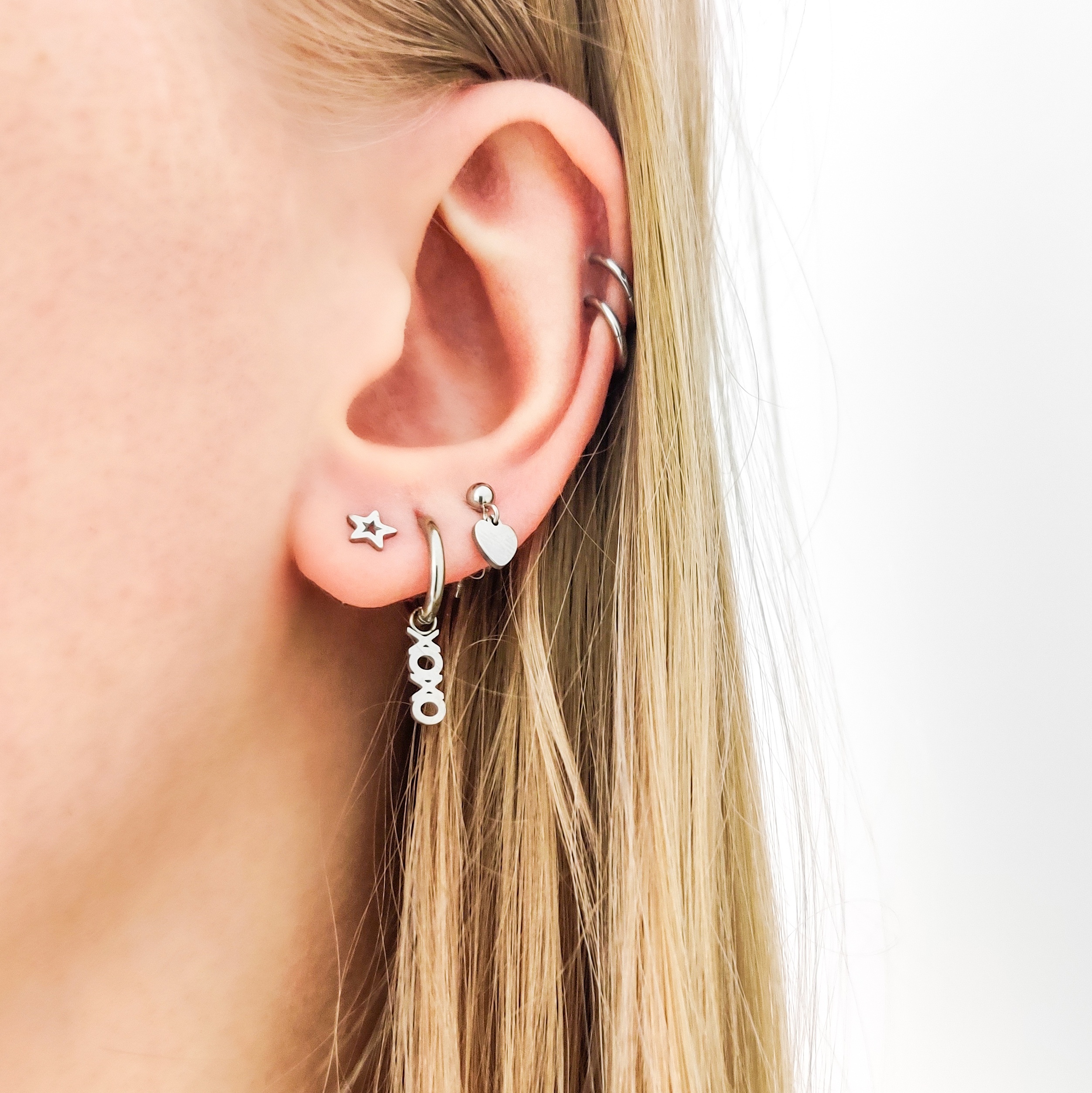 Stud earrings open star